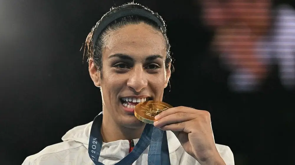 Nhà vô địch Olympic bị nghi ngờ là nam khoe diện mạo mới đầy nữ tính, hé lộ về tương lai - Ảnh 1.